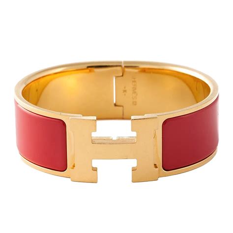 hermes red bracelet with an h letter and silver value